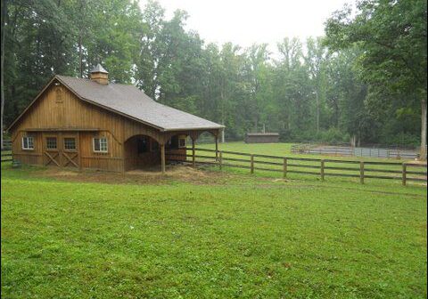 Country barn with fenced pasture